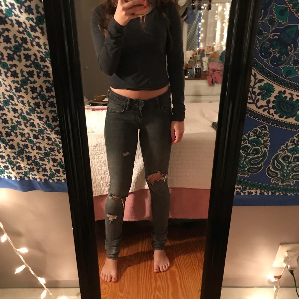 grey ripped jeans
